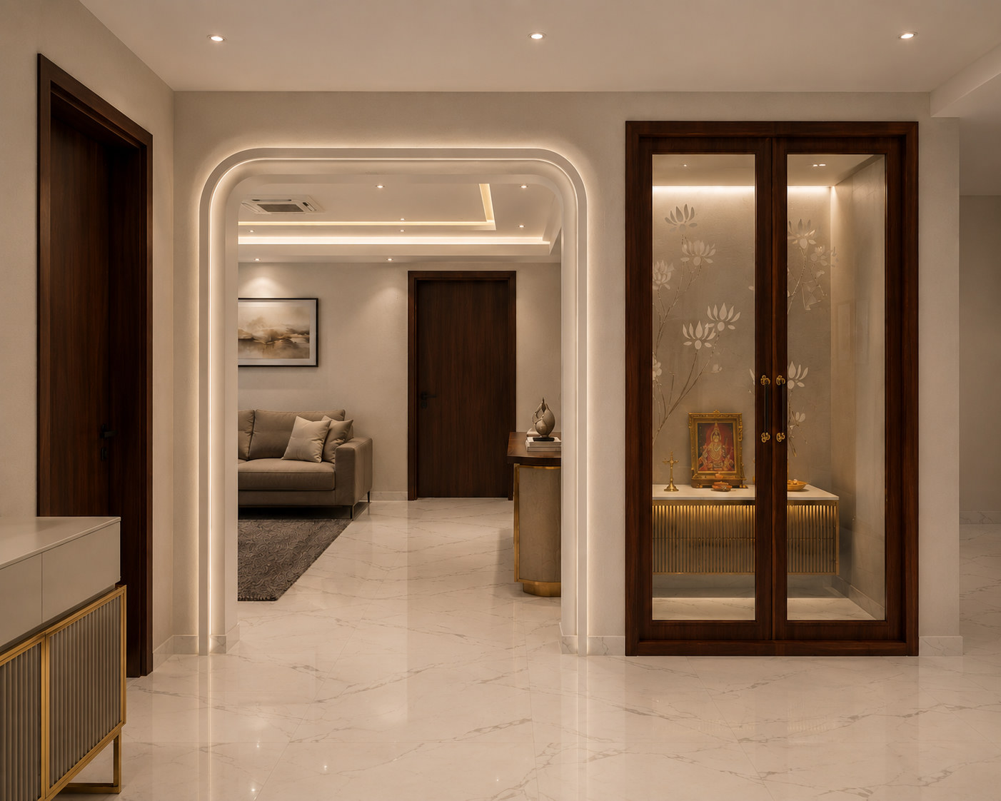Foyer with lit arch and glass puja unit