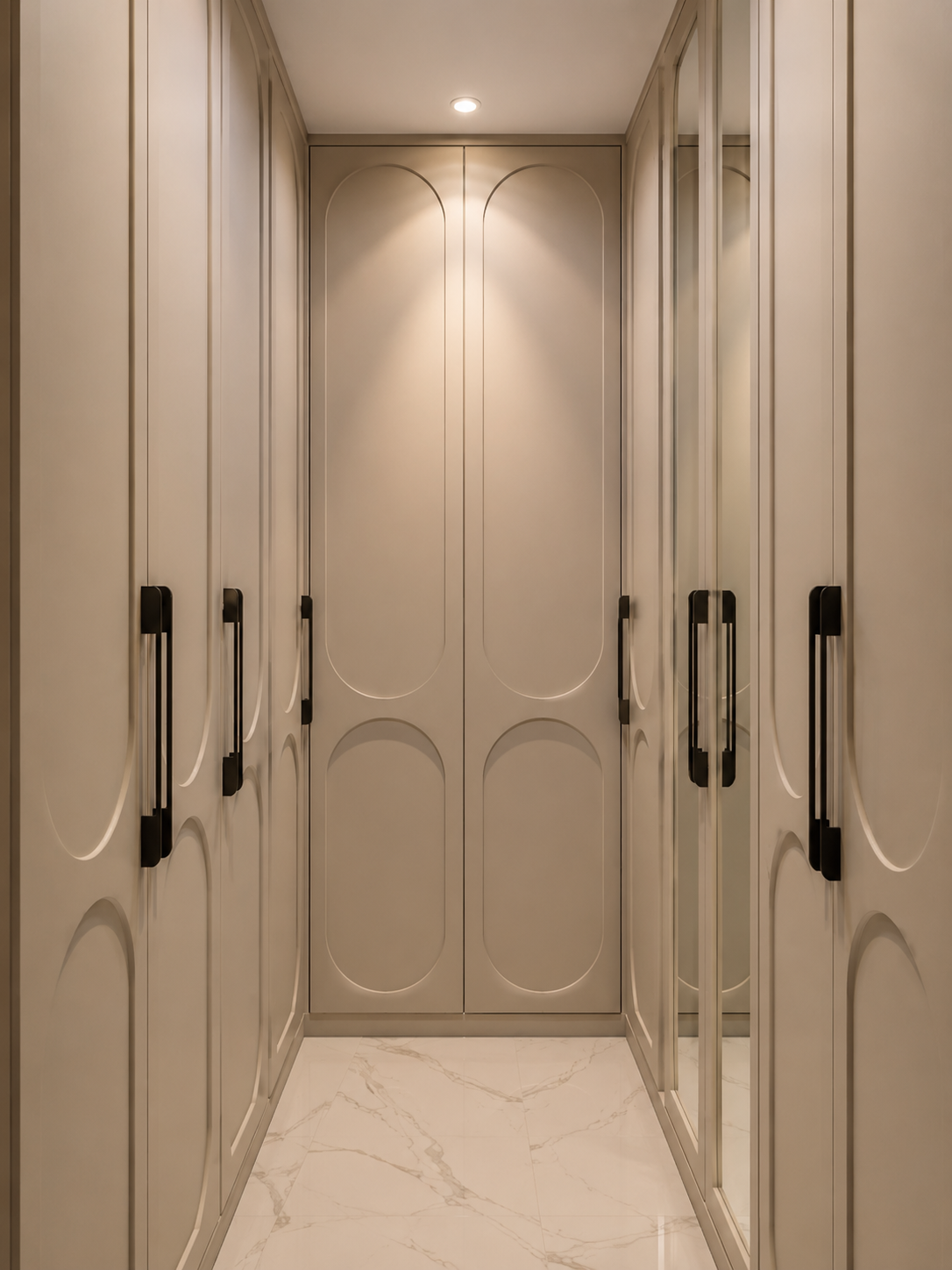 Ivory walk-in wardrobe with arched panels